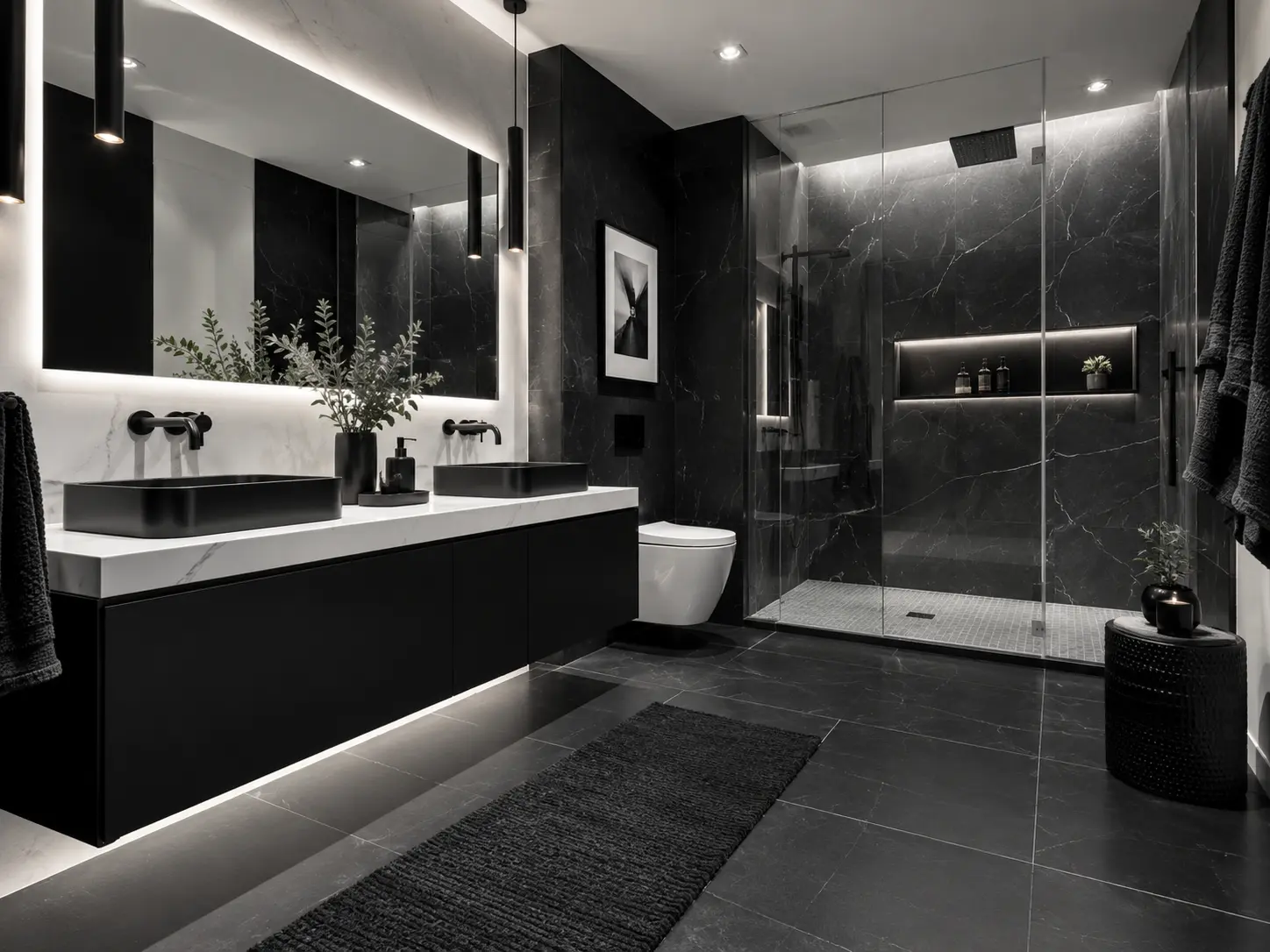 Dramatic black contemporary bathroom with dark marble walls and frameless glass shower